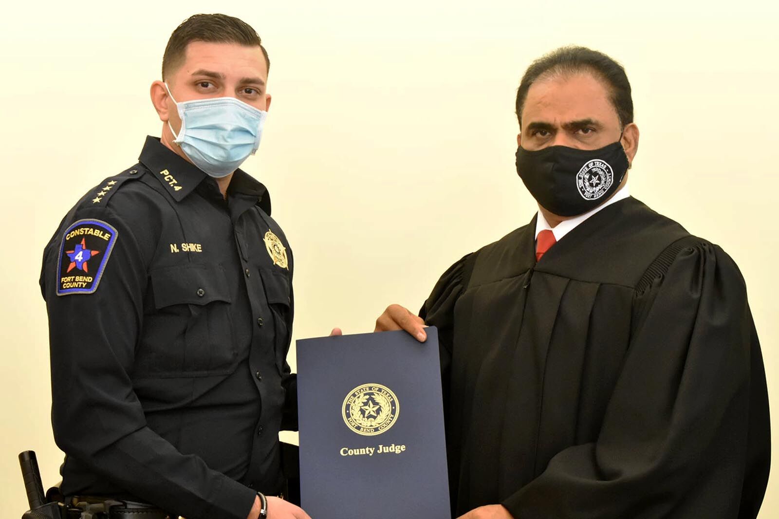 Judge KP George and Constable Nabil Shike